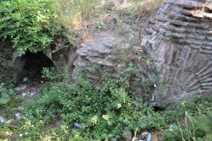 View of the north wall of the western entrance to the Martyrion At left is a niche, at right is the brickwork over the ambulatory passage. June 2017