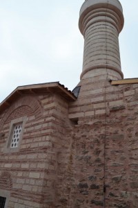 The new wall and minaret with the remains of the Byzantine brickwork