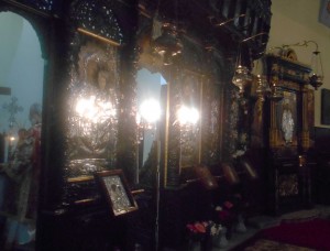 Iconostasis with priest and icons