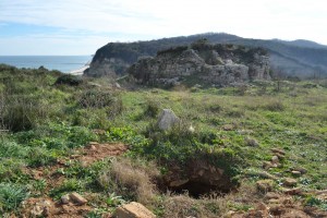 Excavation at northern end of wall in Evcik. Church of St George in background