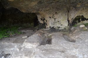 Graves outside north chapel. The 'Kerim' graffiti was apparently carved by a soldier with 561 days of service remaining